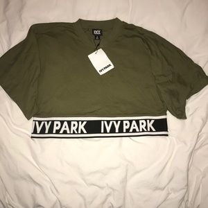 IVY PARK Logo Tape Boxy Tee in Moss